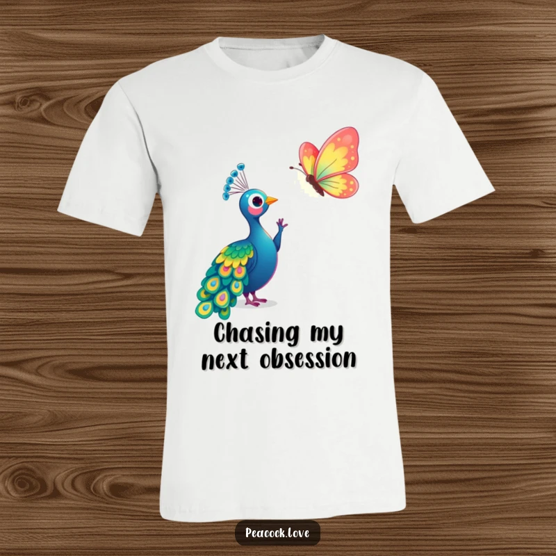 Funny Kawaii Peacock Butterfly T-Shirt: Adorable peacock reaches for a vibrant, shimmering butterfly. Great gift.